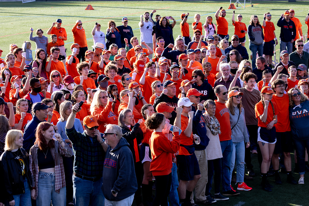 Families of CMB members join their students on Carr's Hill field to sing &quot;The Good Old Song&quot; after the October 23 game day rehearsal. 